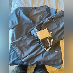 Figs: dark denim. XL top and bottom